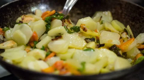 Vegetable ragout is fried in pan. Video stock 56186402