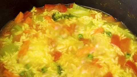 Vegetable rice pilaf simmering. Stock Footage 312311279