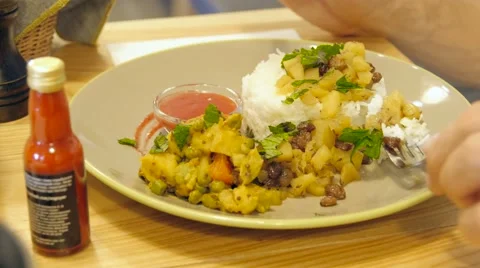 Vegetable risotto made of zucchini, pea, carrot, red bell pepper, and pumpkin Stockbeeldmateriaal 66800368