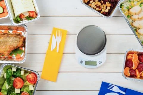 Vegetable roll and kitchen scale Stock Photos