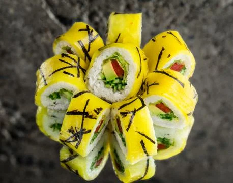 Vegetable roll over concrete background Stock Photos