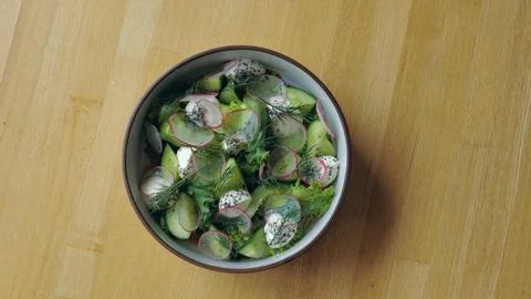 Vegetable salad, chef preparing light salad, vegetarian food, healthy organic Stock Photos