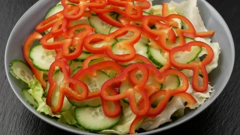 Vegetable salad, close-up. Serving salad. Video stock 165557707