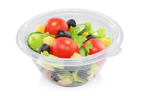 Vegetable salad in container isolated Stock Photos