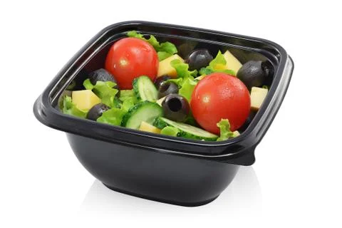 Vegetable salad in container isolated Stock Photos