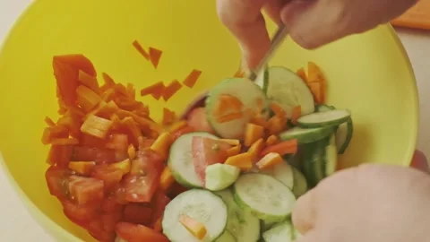 Vegetable salad mixing. Stock Footage 136727112