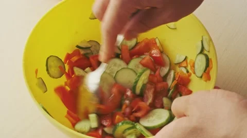 Vegetable salad mixing Stock Footage 136727296
