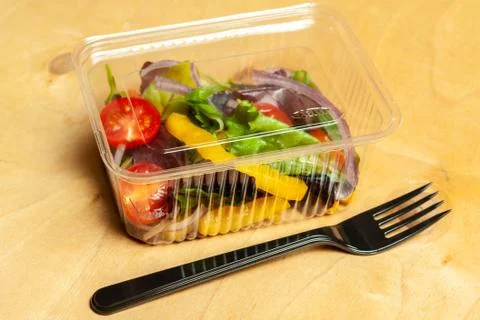 Vegetable salad in a plastic box. Stock Photos