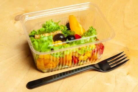 Vegetable salad in a plastic box. Stock Photos