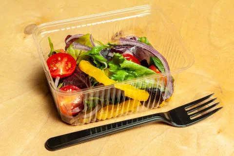 Vegetable salad in a plastic box. Stock Photos