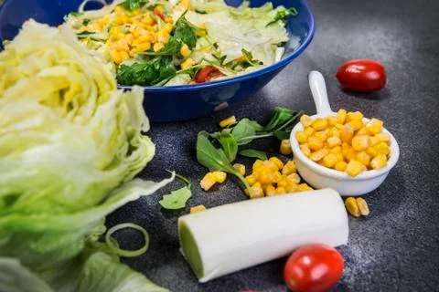 Vegetable salad on the plate with corn Stock Photos
