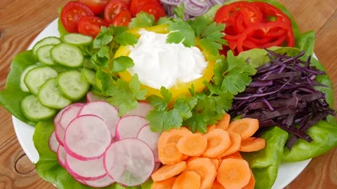 Vegetable salad on a plate. Stock Footage 240079847