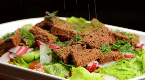 Vegetable salad on a plate rotation Stock Footage 62475367