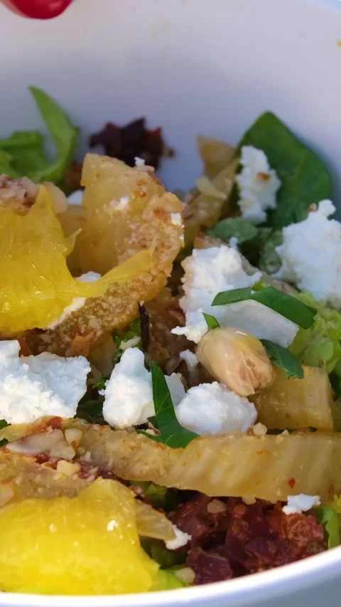 Vegetable salad with pumpkin and cheese and leaves Stock Footage 316071061