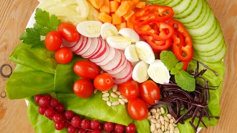 Vegetable salad with quail eggs. Stock Footage 233238668