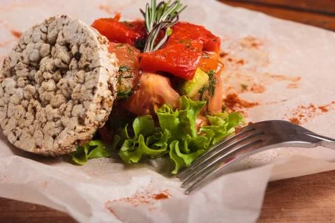 Vegetable salad served on paper Stock Photos