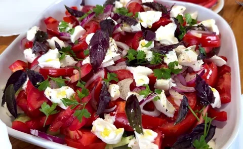 Vegetable salad with soft white cheese Stock Footage 293473765
