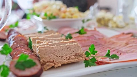 Vegetable Salad Stuffed Deviled Eggs Sliced Ham Meat and Sausage Video stock 239024339