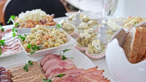 Vegetable Salad Stuffed Deviled Eggs Sliced Ham Meat and Sausage Stock Footage 239024422