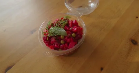 Vegetable salad vinaigrette in plastic container. Delivered, ready to eat. Stock Footage 250097923