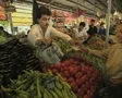 Vegetable seller in market SD Footage