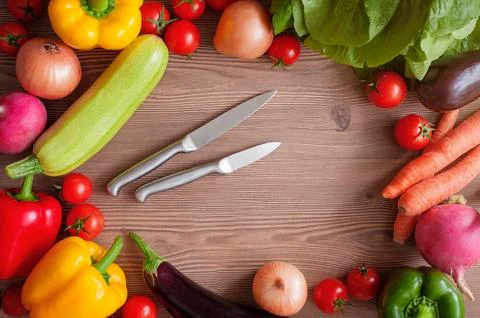 Vegetable set with knifes Stock Photos