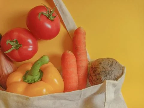 Vegetable set in a textile bag. Copy space for text Stock Photos