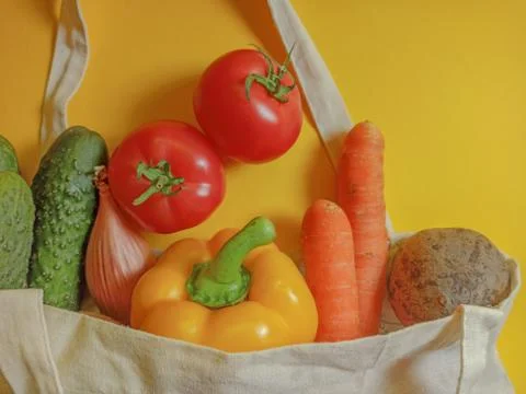 Vegetable set in a textile bag. Copy space for text Stock Photos