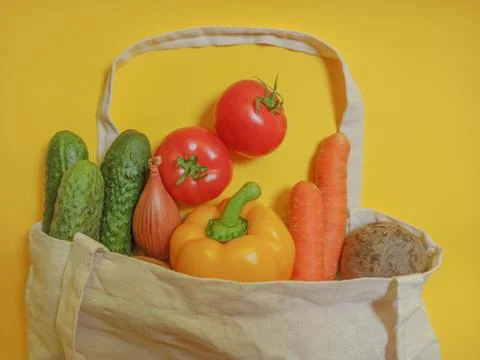 Vegetable set in a textile bag. Copy space for text Stock Photos