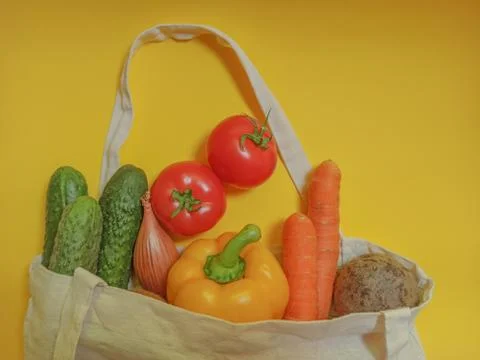 Vegetable set in a textile bag. Copy space for text Stock Photos