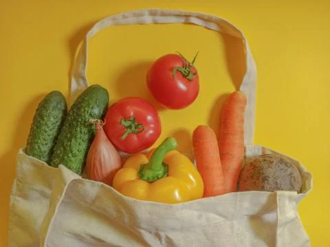 Vegetable set in a textile bag. Copy space for text Stock Photos