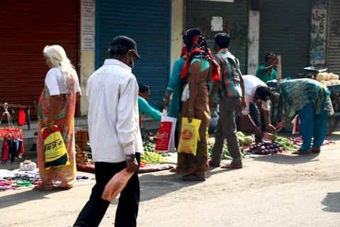 Vegetable shopping during lock down in India Stock Photos