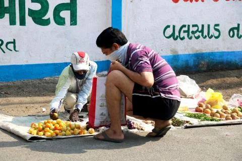 Vegetable shopping during lock down in India Stock Photos