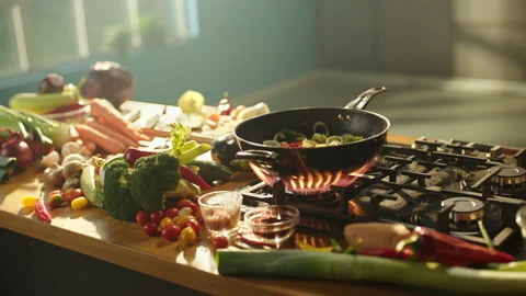 Vegetable sizzling in frying pan Stock Footage 311835122