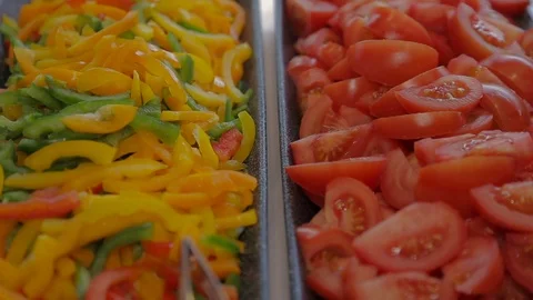 Vegetable slices , tomatoes, paprika Close up with selective focus Stock Footage 75846824