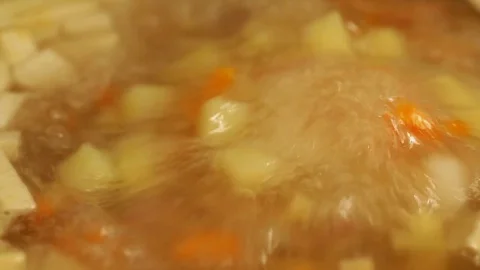 Vegetable soup boiling closeup Stock Footage 79430354