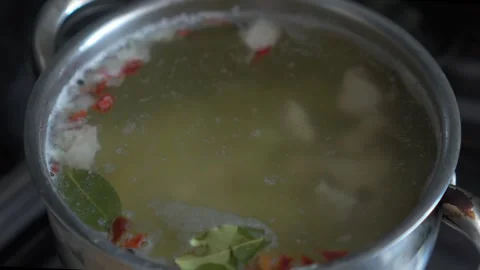 Vegetable soup is cooked on the stove. Stock Footage 248684722