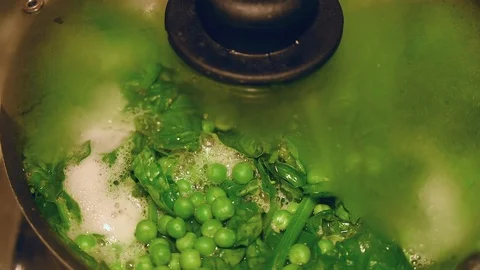 The vegetable soup minestrone  is boiling Stock Footage 105081792