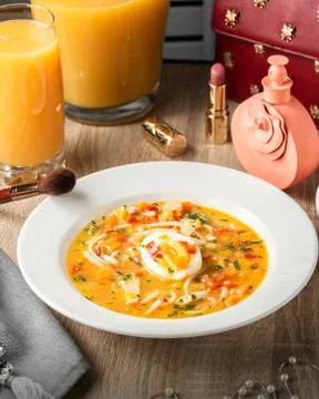 Vegetable soup with orange fresh on the table Stock Photos