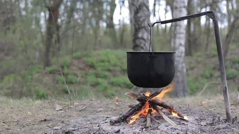 Vegetable soup outdoors in a cauldron Video stock 88809779