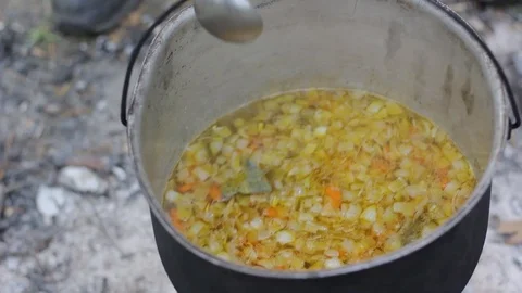 Vegetable soup outdoors in a cauldron Stock Footage 88810007