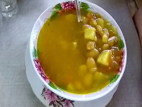 Vegetable soup, plate, spoon, lunch, beans, water, Stock Footage 75609733