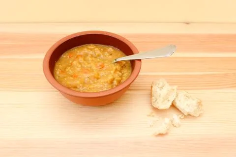 Vegetable soup with remainder of bread roll Stock Photos