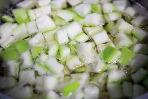 Vegetable soup while cooking. Soup with green vegetable very healthy Stock Photos