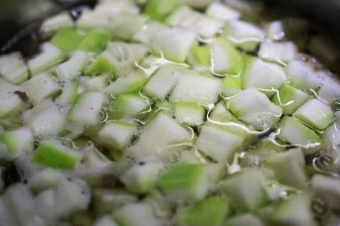 Vegetable soup while cooking. Soup with green vegetable very healthy Stock Photos