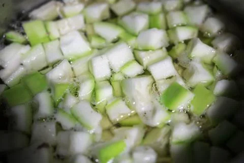 Vegetable soup while cooking. Soup with green vegetable very healthy Stock Photos
