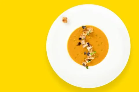Vegetable soup on yellow Stock Photos