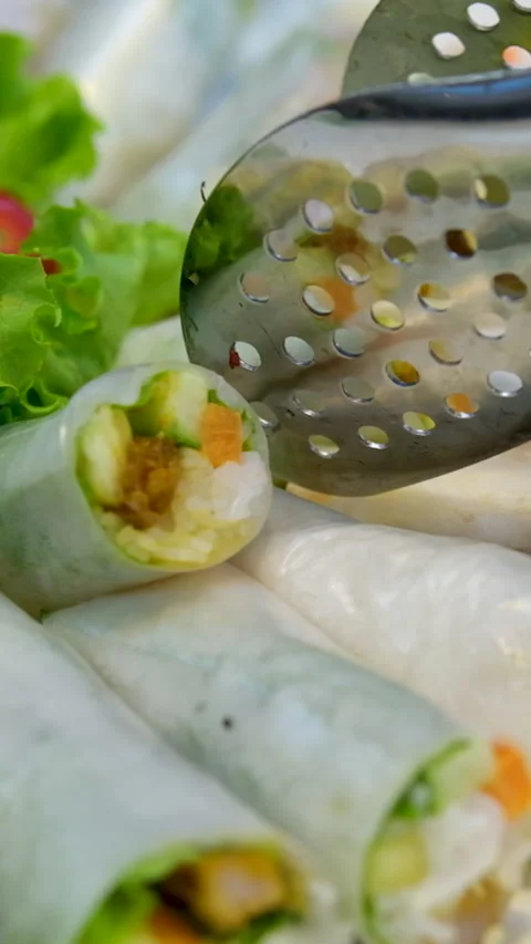 Vegetable spring rolls Spring roll with shrimps and vegetables inside close-up Stock Footage 276626102