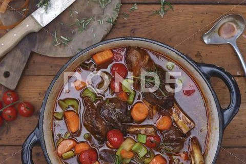 Vegetable stew with leg of lamb and rosemary Stock Photos