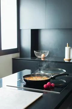 Vegetable stew in a pan at the modern kitchen Stock Photos